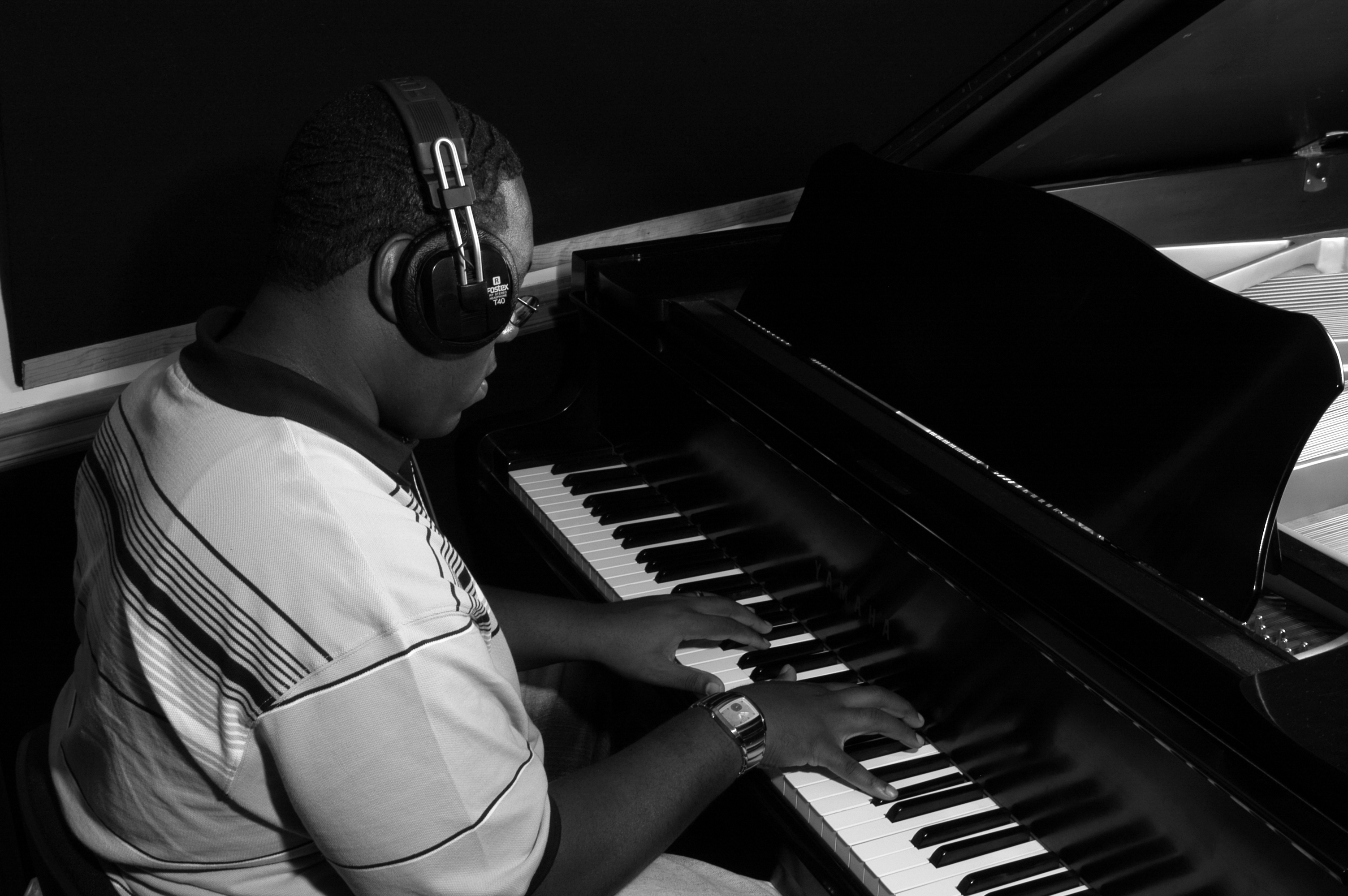 Kenneth Bryant II at the grand piano — Dogwood Studios